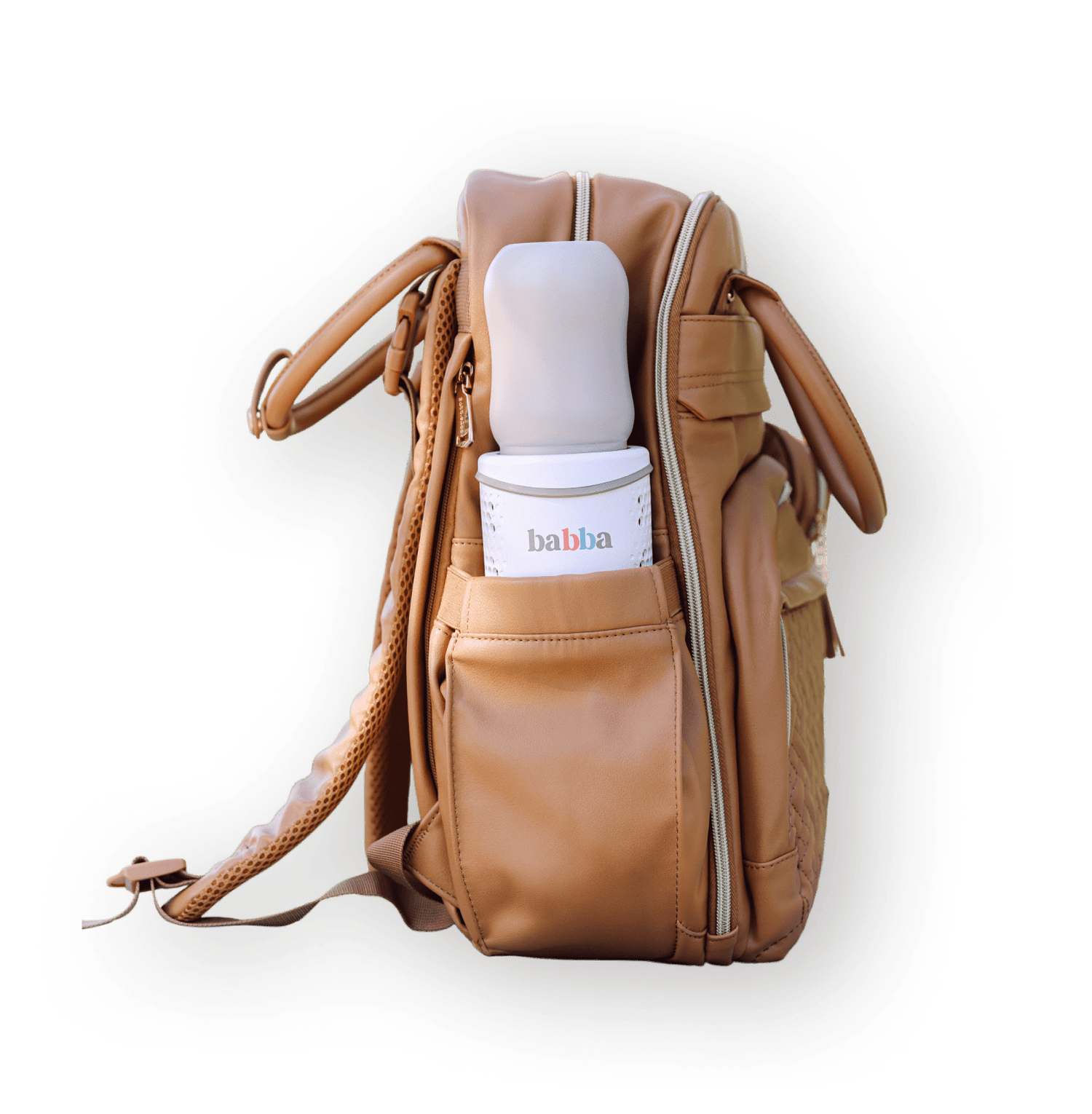 Babba portable baby bottle cooler and warmer tucked into a bag pocket, ideal for travel and on-the-go parents.